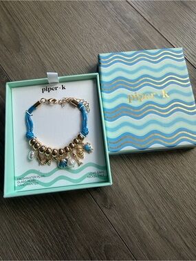 Piper·k Blue Charm Bracelet with Gold Accents